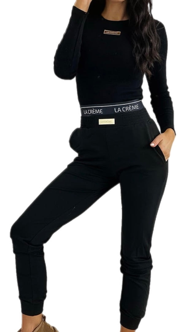 Top and sweatpants - 2 piece set. Woman's tracksuit. Colour:  black