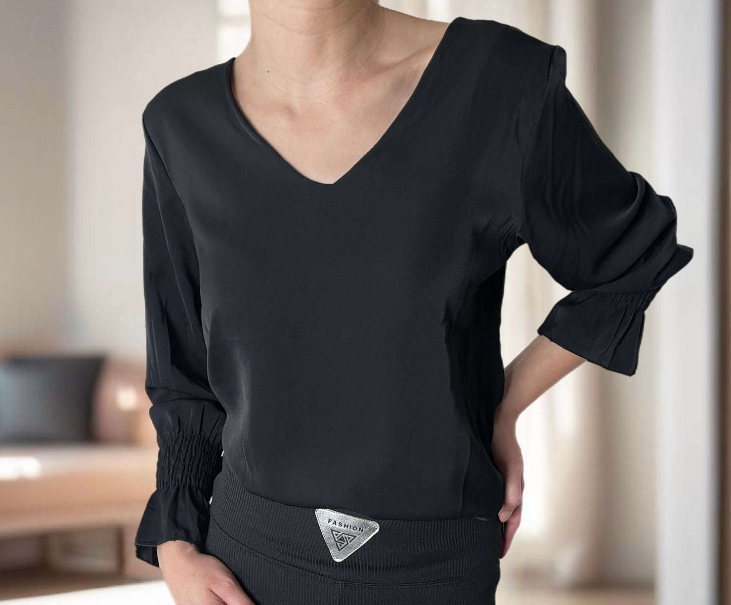 Black blouse, top, long sleeve.
