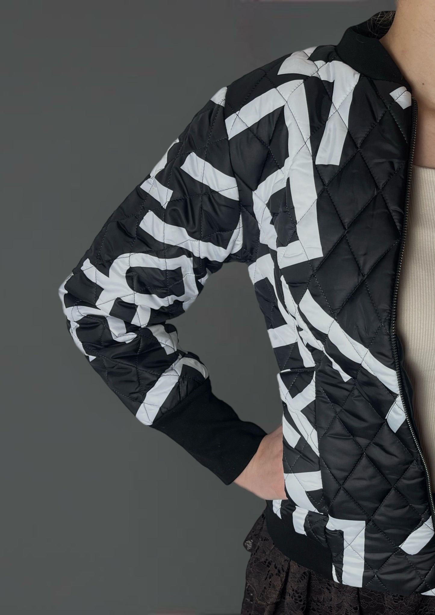 Black jacket with white patterns. Slim.